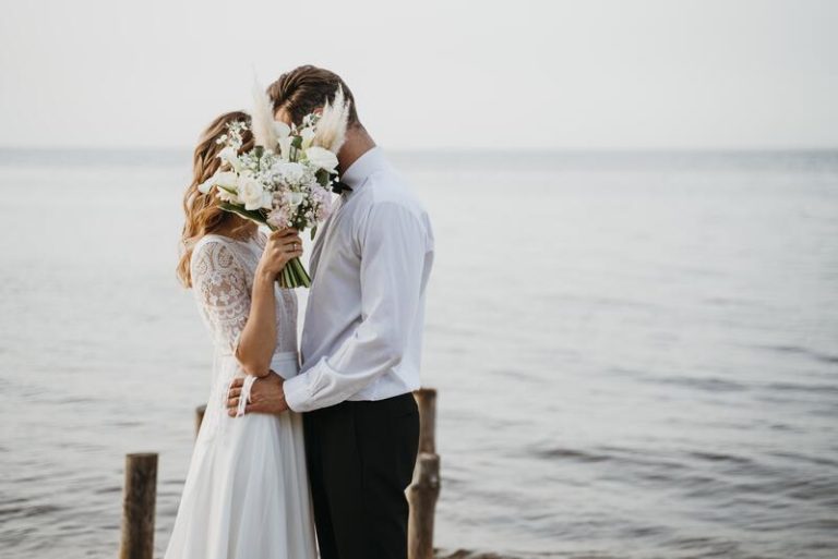 beautiful-couple-having-their-wedding-beach (1)