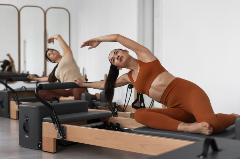 people-taking-pilates-reformer-class (1)