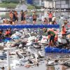 Foto: Dinas Lingkungan Hidup (DLH) DKI Jakarta mengangkut sebanyak 137 ton sampah dari kawasan pesisir Tanggul Laut Muara Baru, Jakarta Utara. (dok DLH DKI)