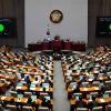 Majelis Nasional mengesahkan undang undang untuk mengimplementasikan investasi AS senilai ratusan miliar dolar di Gedung Majelis Nasional di Seoul Korea Selatan Kamis 12 Maret 2026 AP PhotoAhn Young joon