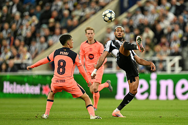 Newcastles Brazilian forward 07 Joelinton R kicks the ball during the UEFA Champions League first round football match between Newcastle United FC and FC Barcelona at St James Park in Newcastle on September 18 2025 Photo by Oli SCARFF  AFP via Getty Images