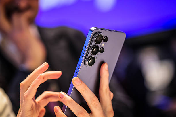 An attendee inspects a Samsung Galaxy S26 Ultra smartphone at the MWC Barcelona 2026 in Barcelona Spain on Monday March 2 2026 This years edition of MWC is heavily geared toward AI and establishing best practices to leverage it to drive sales and wider adoption Photographer Angel GarciaBloomberg via Getty Images