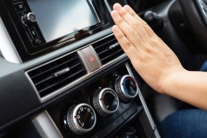 A woman caught the steering wheel of a car while driving to work.
